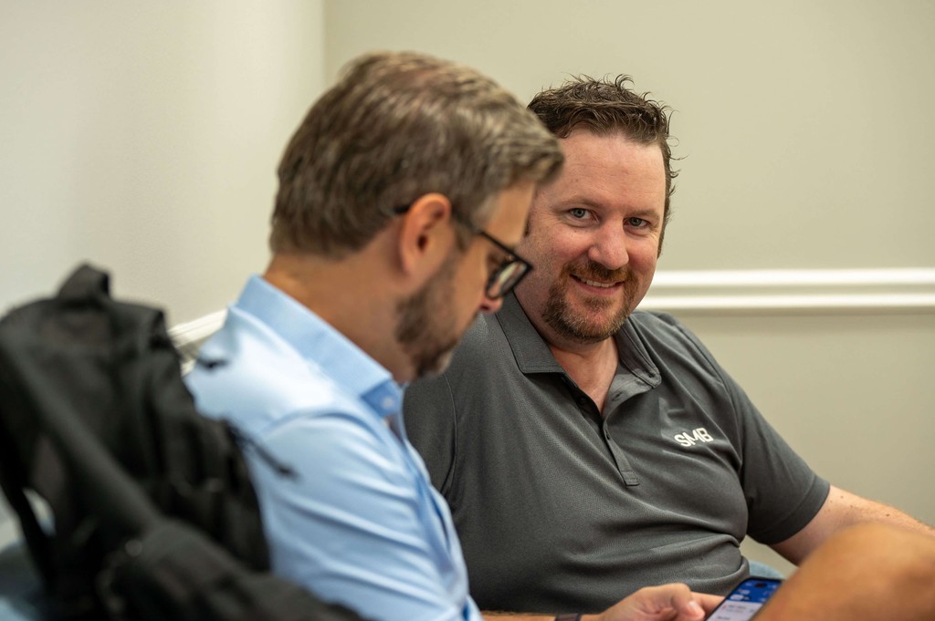 SMB Law Group team members in conversation